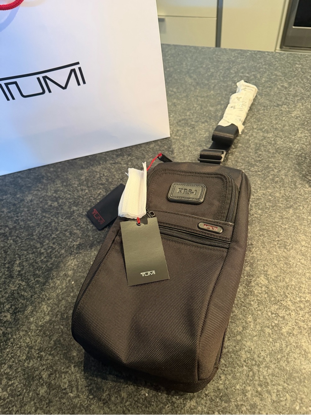 Tumi Black Sling Belt Bag with Front Zip Pocket